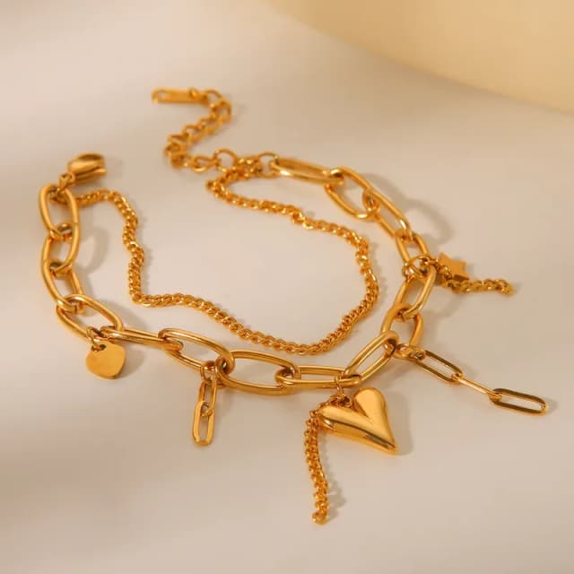 EVA - Pulsera doble con dijes, acero inoxidable bañada en Oro 18K